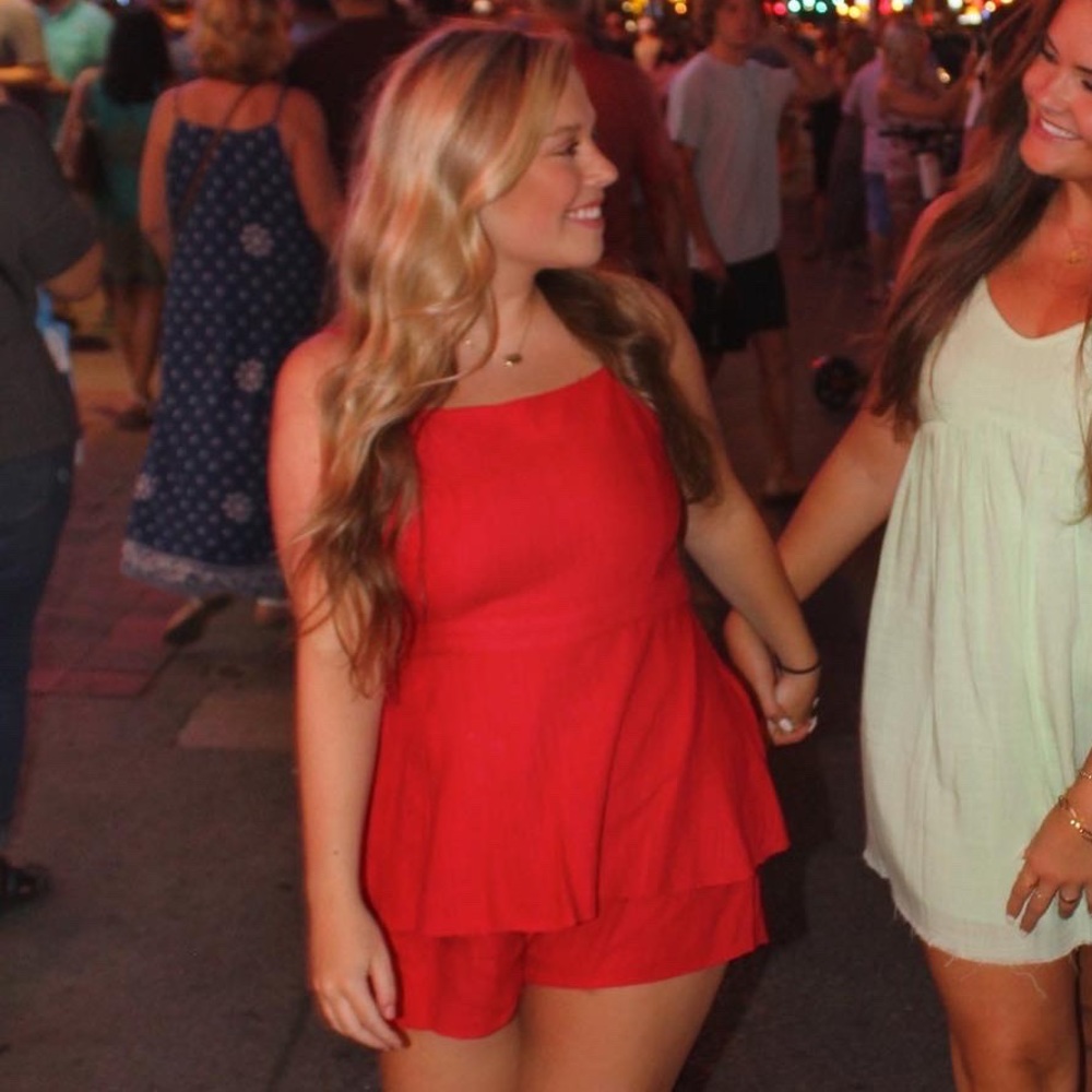 Red romper with open back! only worn once!